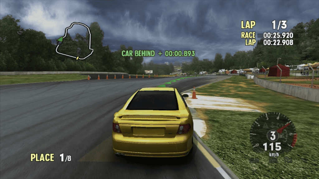 Image shows a yellow car on a running track