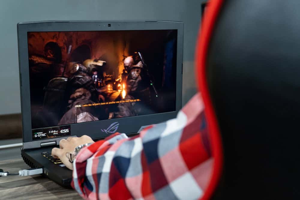 Person playing on PC with a high update rate