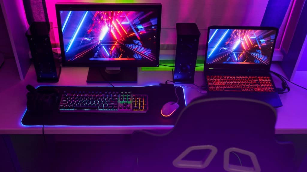 Complete gamer countertop, with PC, gamer chair, monitors, speaker, etc.