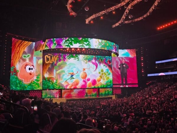 Someone on stage introducing the new Disney animation called Clay