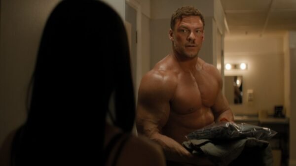 Alan Ritchson in a production still from Season 4 of Reacher.